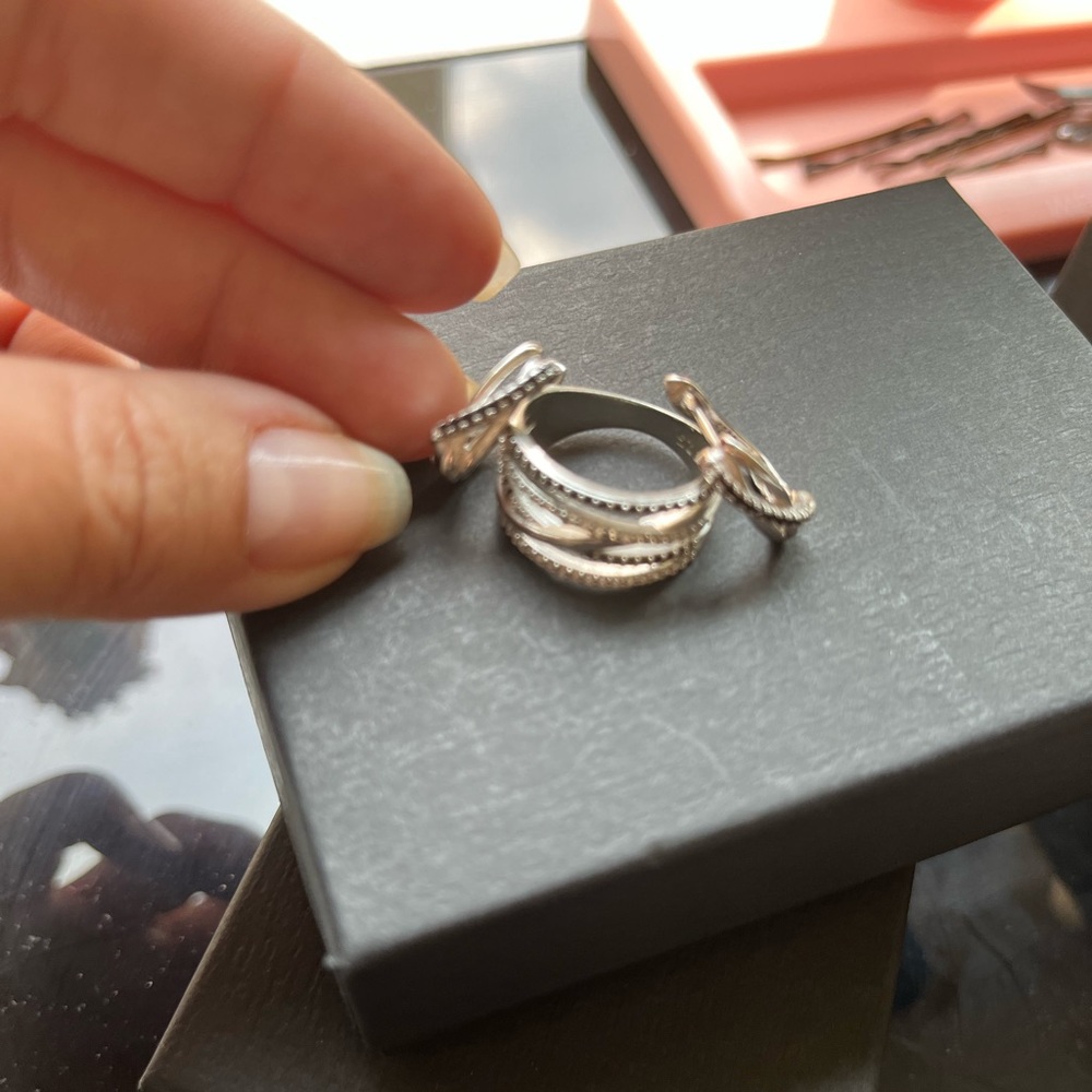 Women ring and earring set, silver finish with black stones.